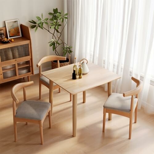 Minimalist dining table with chairs in a bright room