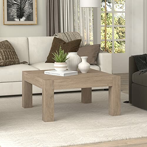 Modern living room with wooden coffee table and decor.