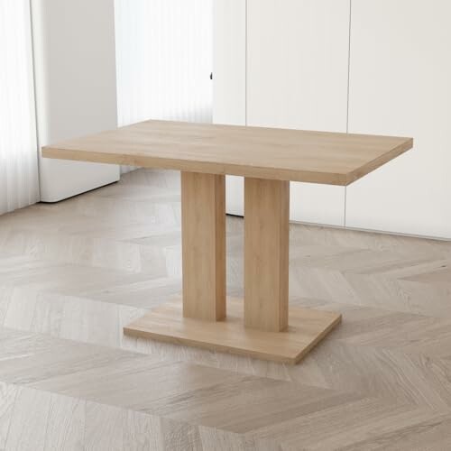 A modern wooden table with a rectangular top and dual pedestal base.