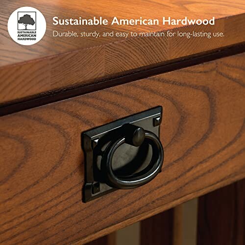 Close-up of a wooden drawer with metal handle, labeled Sustainable American Hardwood.