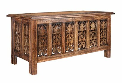 Ornately carved wooden storage chest