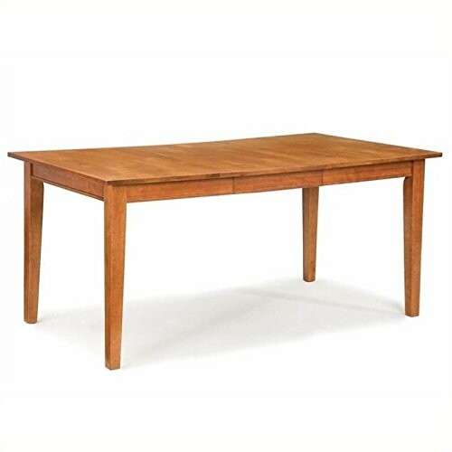 Wooden dining table with four legs