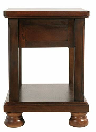 Wooden end table with shelf and legs.