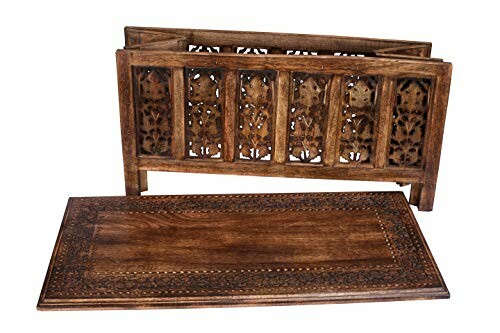 Intricately carved wooden folding table