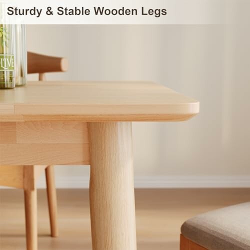 Close-up of a wooden table with sturdy legs.